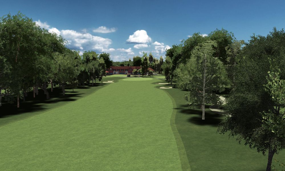 Golf course with green grass and trees under a blue sky