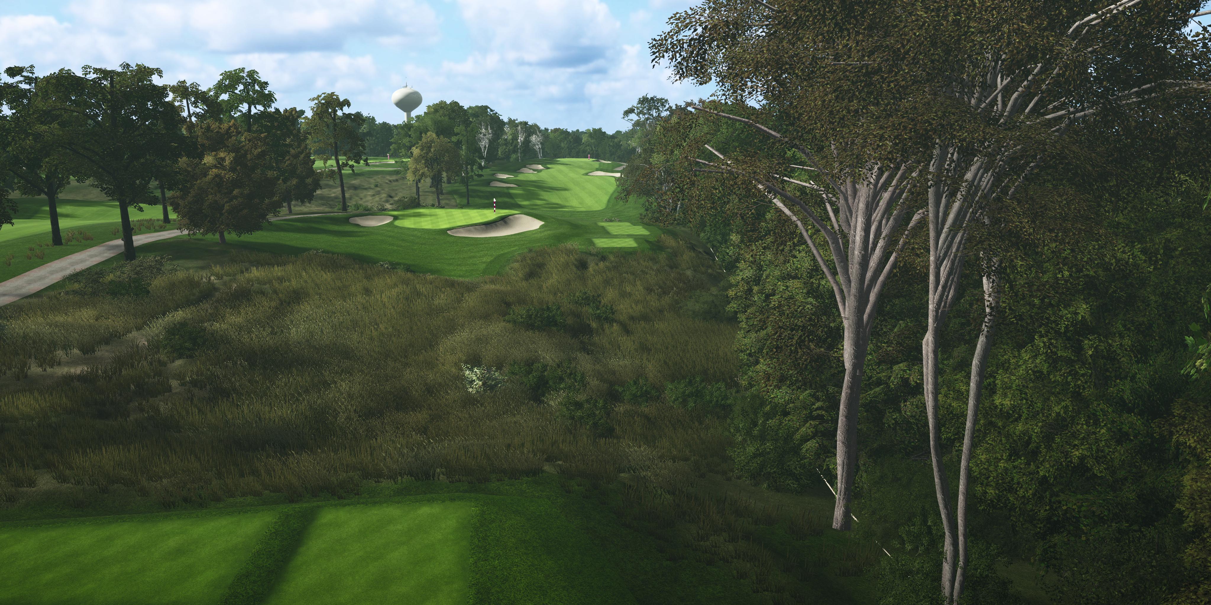 Manasquan River Golf Club hole with green fairway and trees on a partly cloudy day