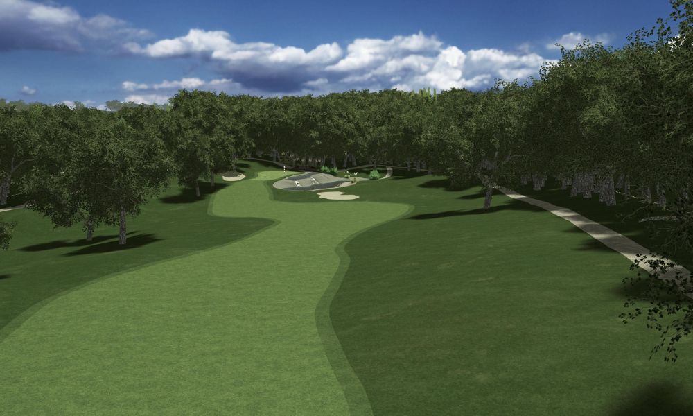 Golf course with green grass, trees, and a clear blue sky.