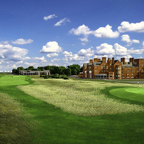 Royal Troon Golf course with a clubhouse under a blue sky with clouds