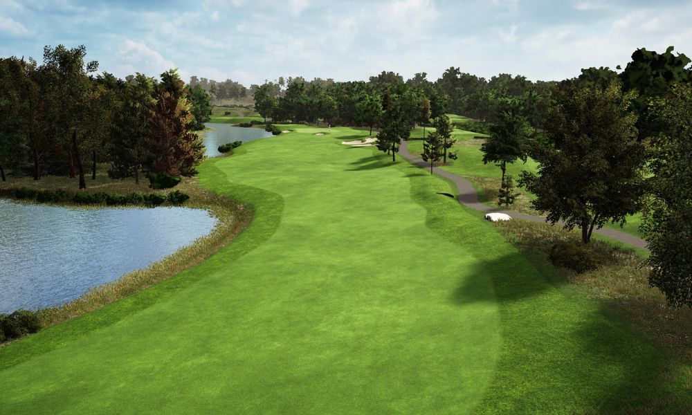 Golf course with green grass, trees, and a lake