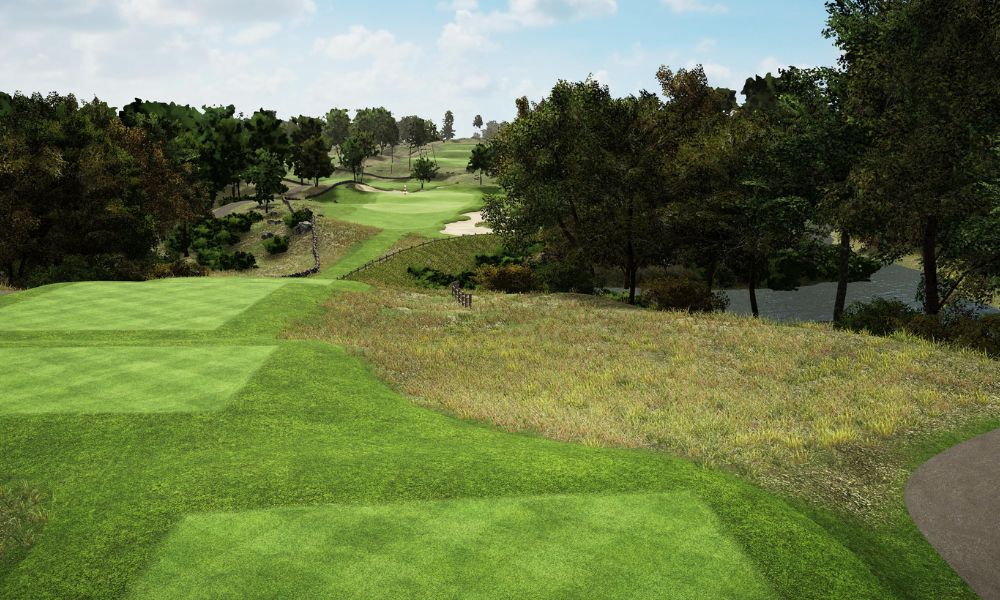 Golf course with green grass, trees, and a clear sky