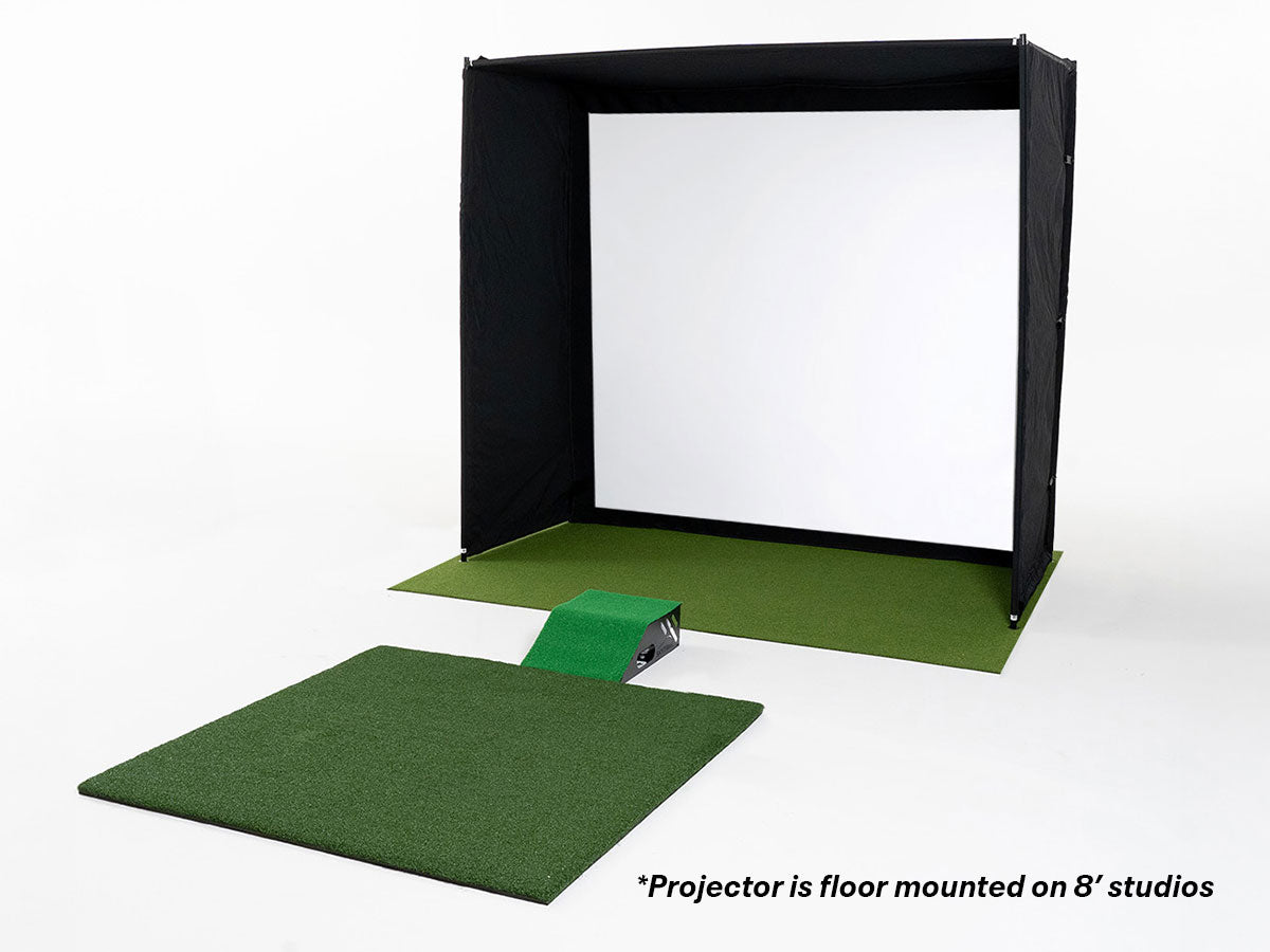 Portable studio setup with a screen, green floor mat, and projector on a white background.