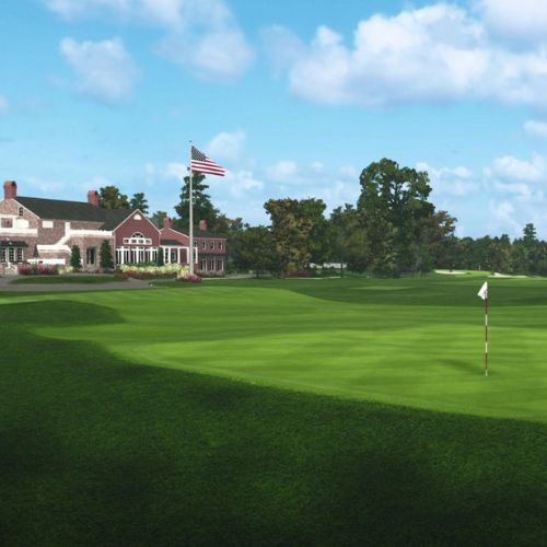 Manasquan River Golf Club with a clubhouse, green grass, and trees under a blue sky.