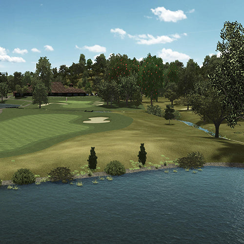 Golf course with green grass, trees, and a body of water under a blue sky.