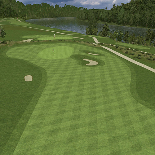 Golf course with green grass, sand bunkers, and a lake in the background