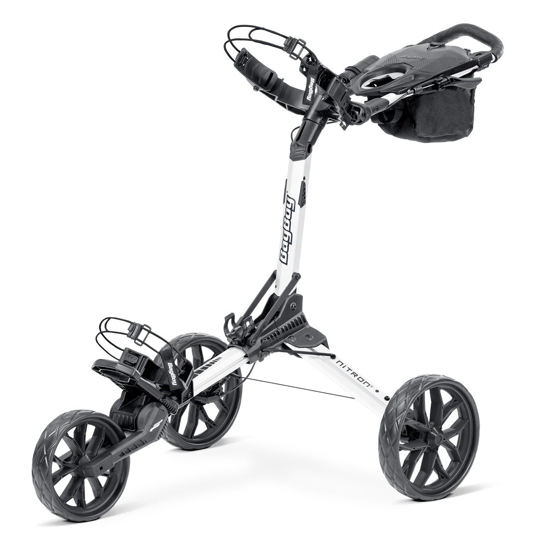 Bag Boy Nitron golf push cart in white and black, highlighting the compact folding design and premium build quality of this popular golf trolley.
